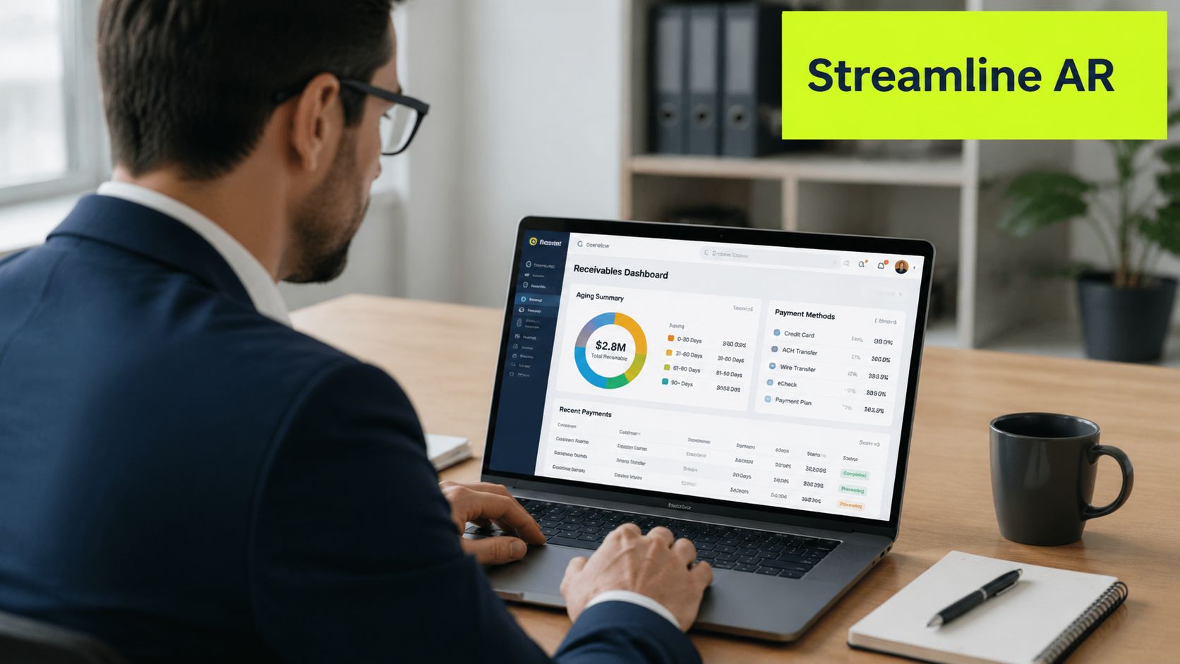 A professional man in a suit working on a laptop displaying a financial receivables dashboard.